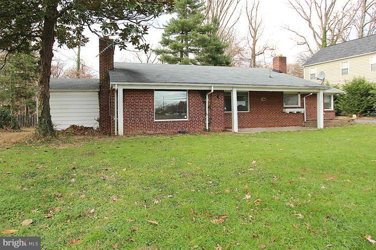 10510 Rodney Road Silver Spring, MD 20903 - Photo 3 of 30 a front view of a house with yard and trees