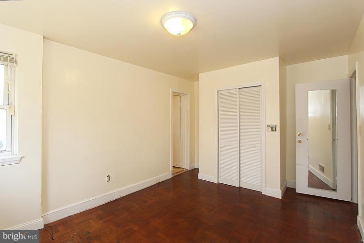 10510 Rodney Road Silver Spring, MD 20903 - Photo 22 of 30 a view of empty room with wooden floor