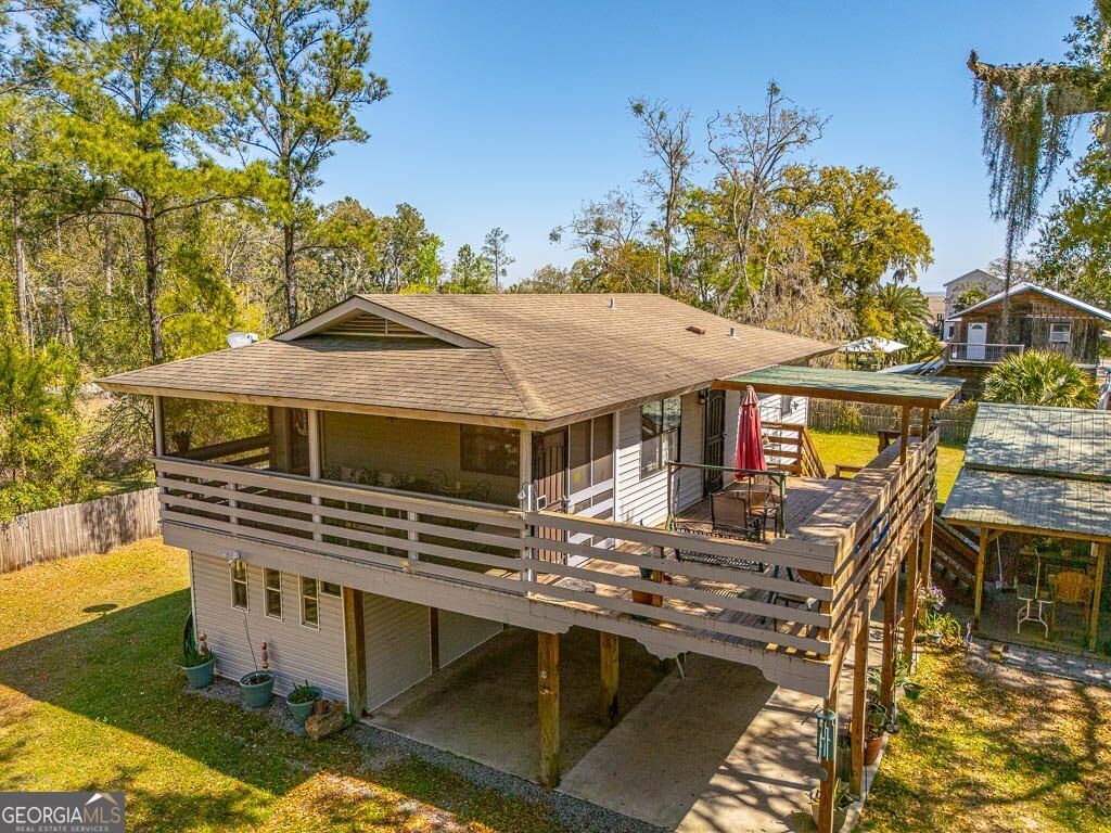33 Warren Avenue Waverly, GA 31565 - Photo 63 of 63 an aerial view of a house with a ocean view