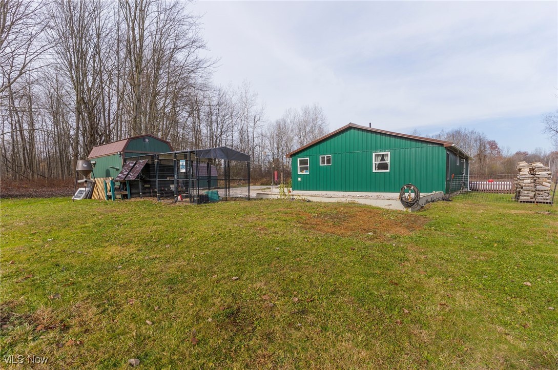 6590 Hall Road Andover, OH 44003 - Photo 23 of 29 View of yard with shed and chicken coop