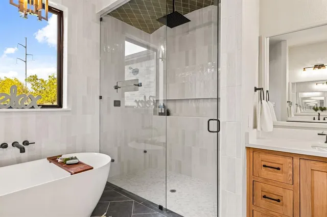 a bathroom with a sink and a shower