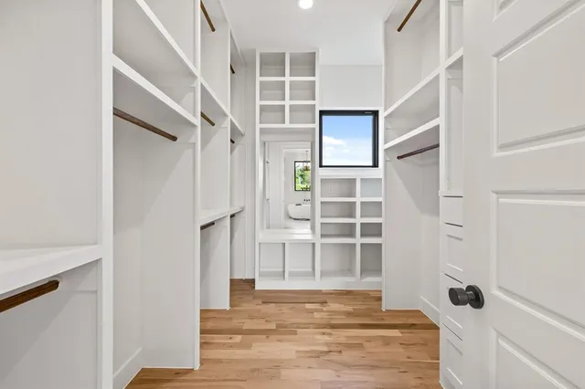 a view of an empty walk in closet