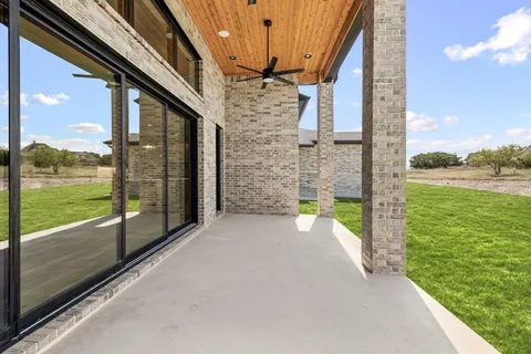 a view of a balcony with an ocean view