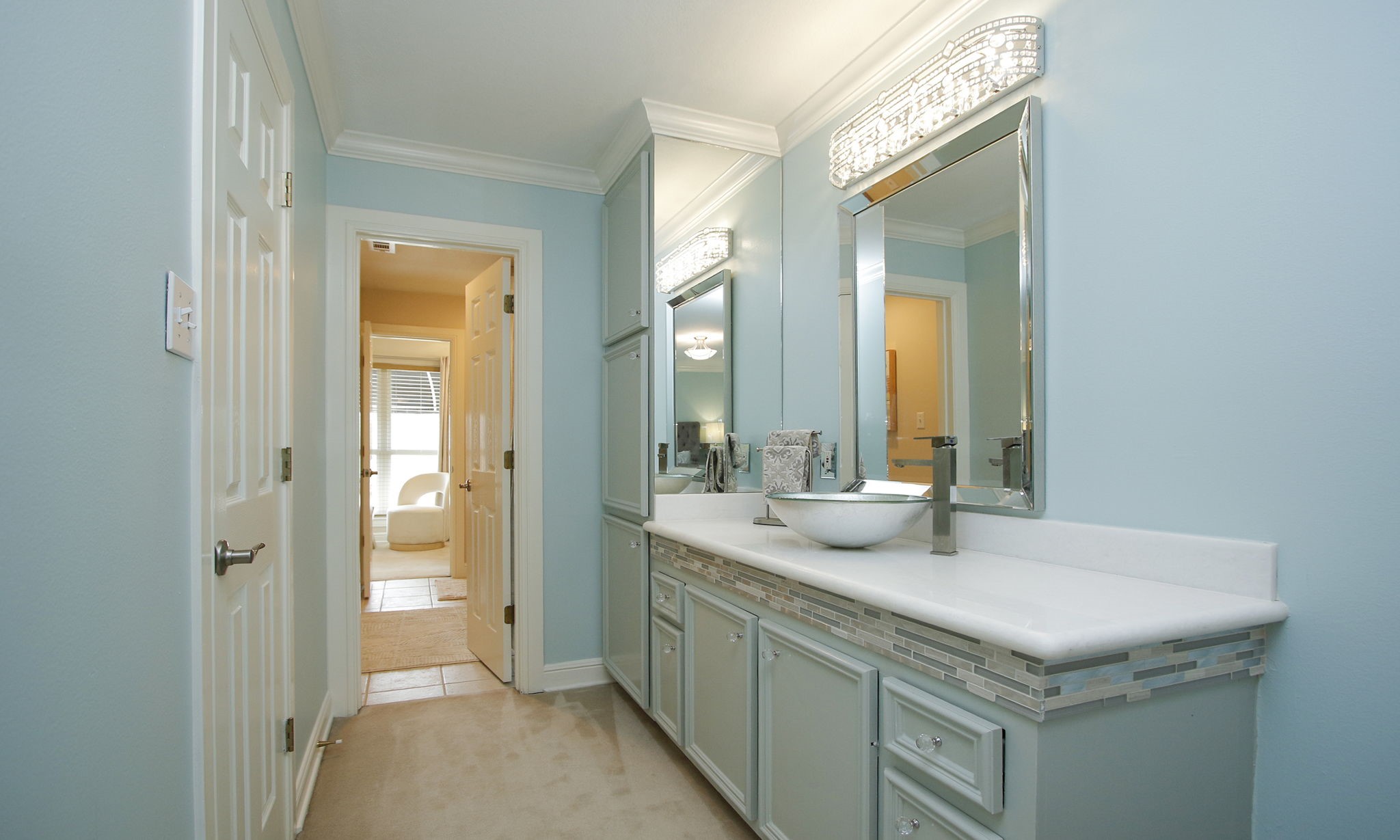 16610 Manningtree Lane Spring, TX 77379 - Photo 38 of 50 The vanity of this bedroom was beautifully updated with new counters, sink, lighting and mirror.