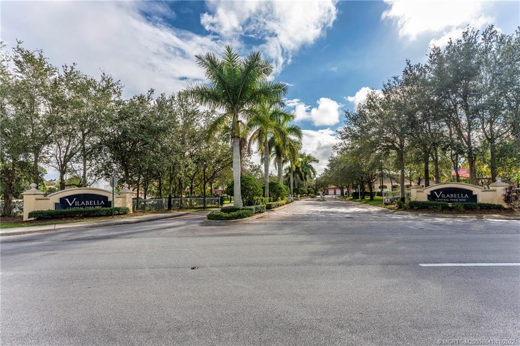 61 Southeast Palermo, Unit 202 Stuart, FL 34994 - Photo 3 of 10 a view of street with parked cars