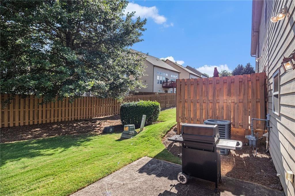 350 Beynon Terrace Suwanee, GA 30024 - Photo 4 of 7 a view of garden with patio