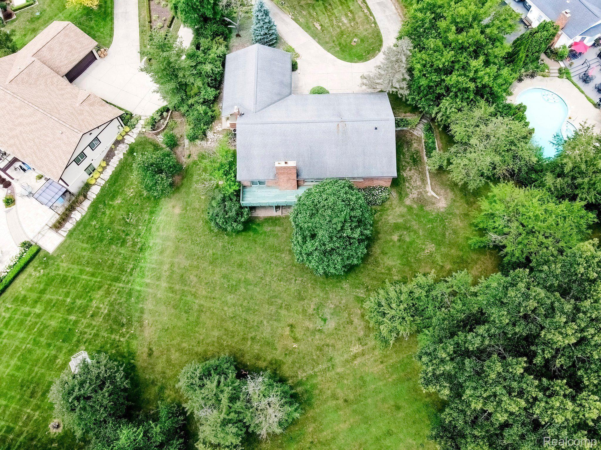 5211 Darby Circle Rochester, MI 48306 - Photo 47 of 49 Surrounded by mature trees