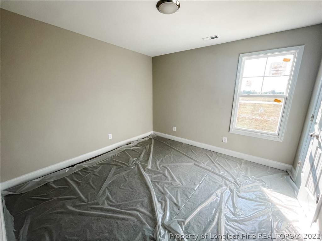 185 Winnsboro (lt113) Road Raeford, NC 28376 - Photo 14 of 19 a view of a room with window