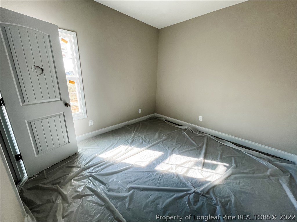 185 Winnsboro (lt113) Road Raeford, NC 28376 - Photo 9 of 19 a view of empty room with wooden floor