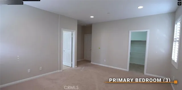 wooden floor in a hall with a window