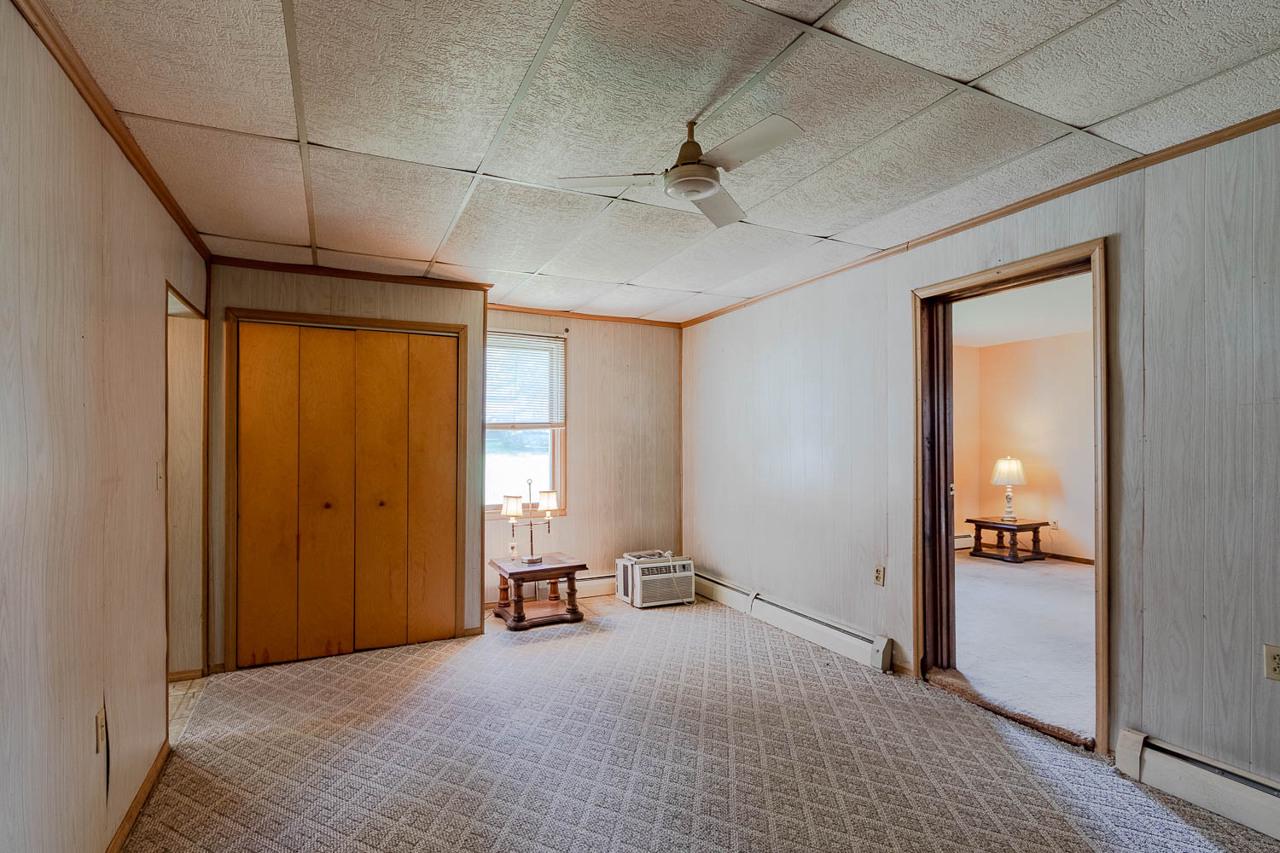203 Gorton Road Moshannon, PA 16859 - Photo 18 of 39 a furnished livingroom with a windows and ceiling fan