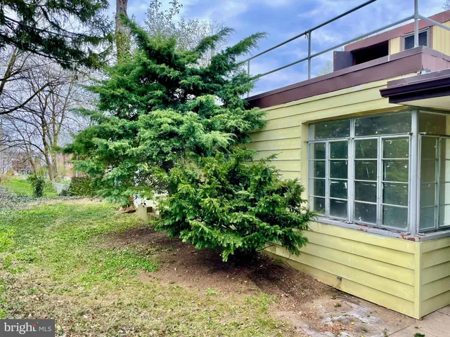 a house view with a garden space