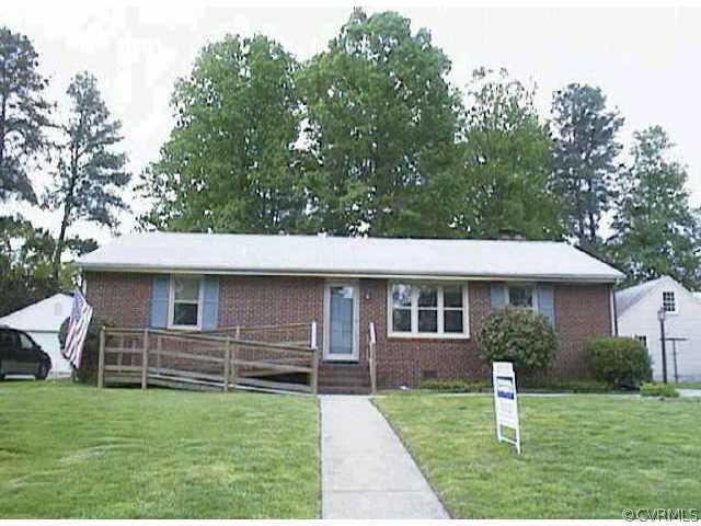 903 Yorkshire Road Colonial Heights, VA 23834 - Photo 1 of 1 a front view of a house with a yard