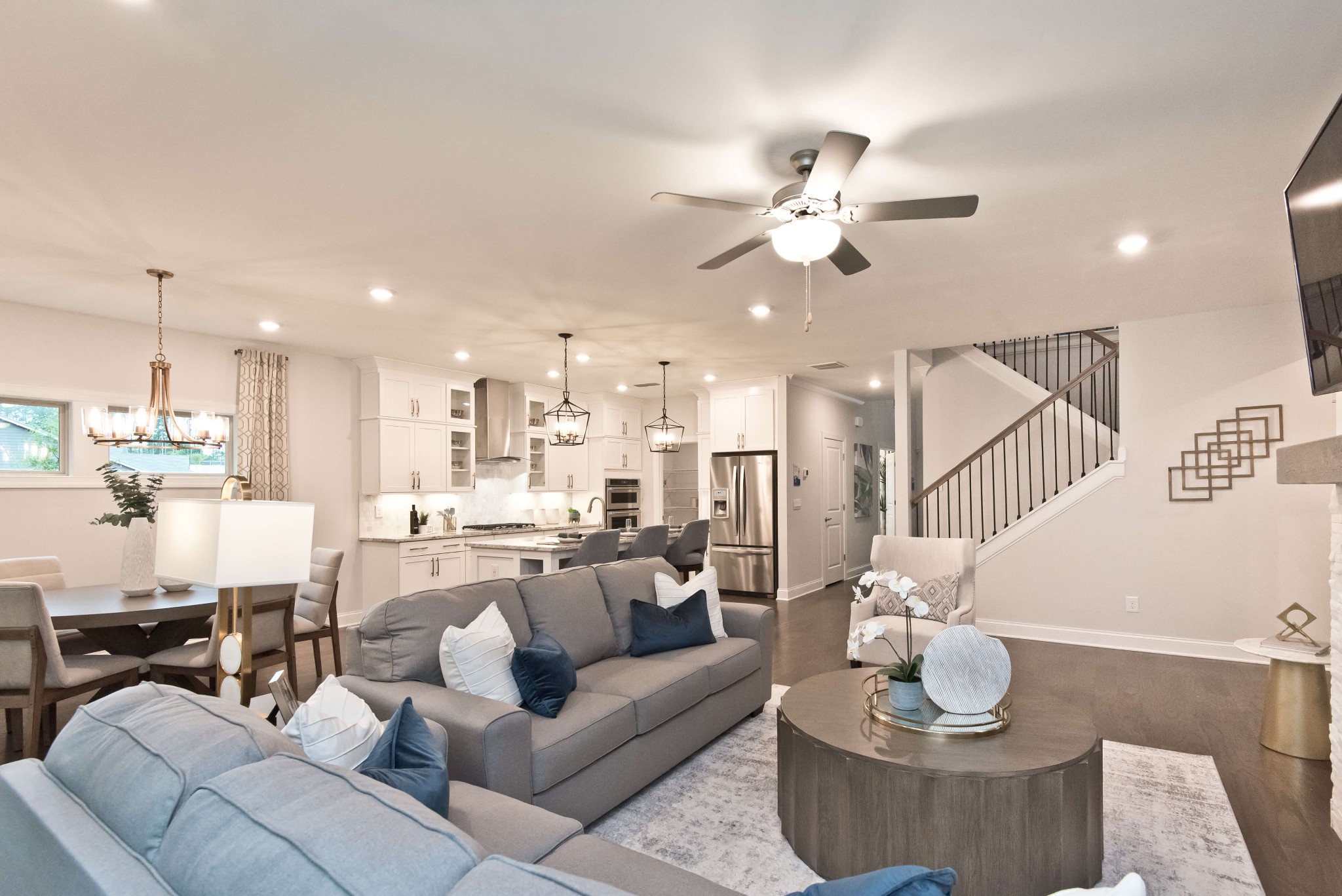 711 Castle Road Mount Juliet, TN 37122 - Photo 7 of 19 a living room with furniture kitchen view and a chandelier