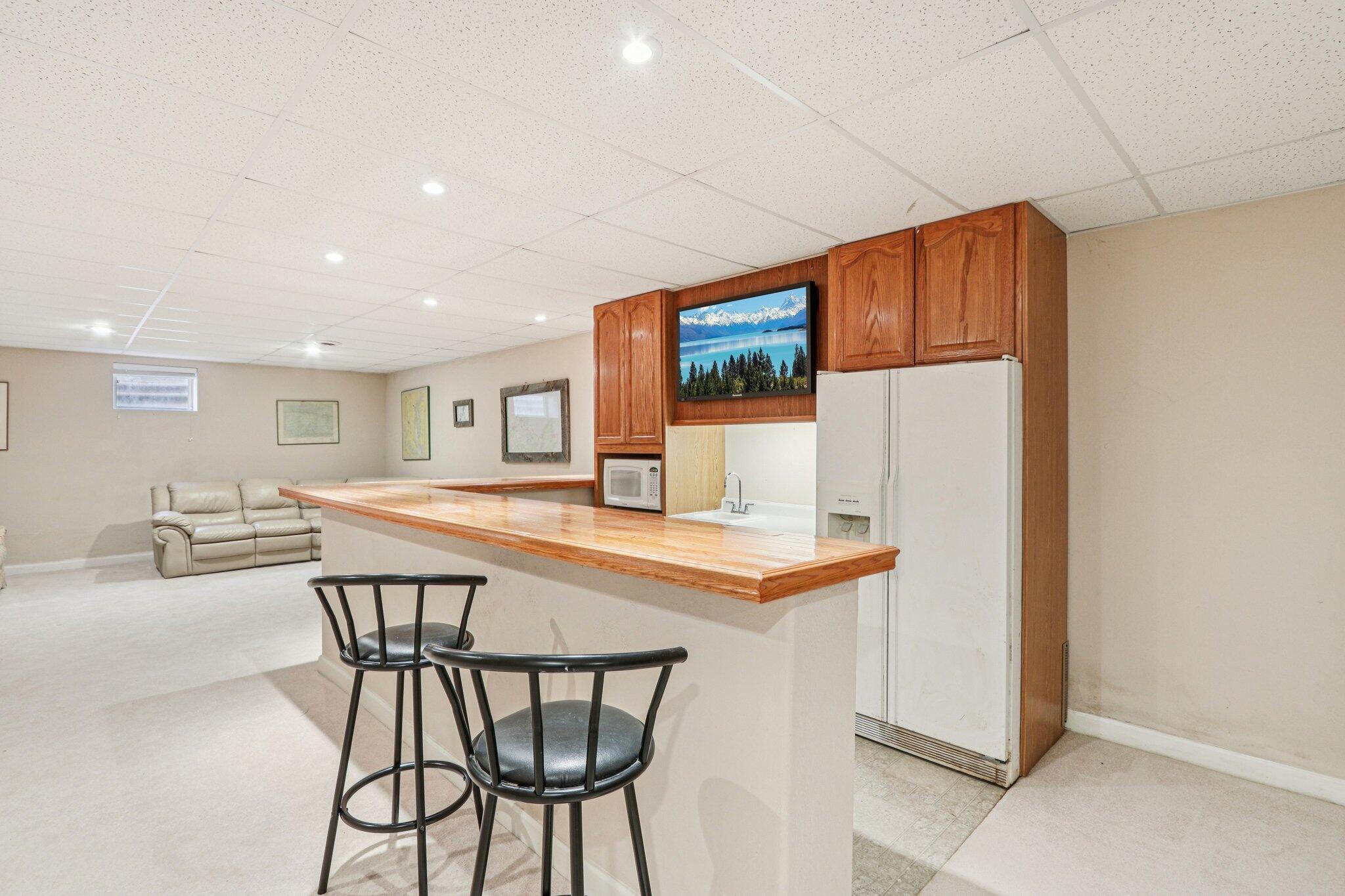 1274 Gullane Court, Unit 1519 Geneva, WI 53147 - Photo 40 of 70 Lower Level Bar Area