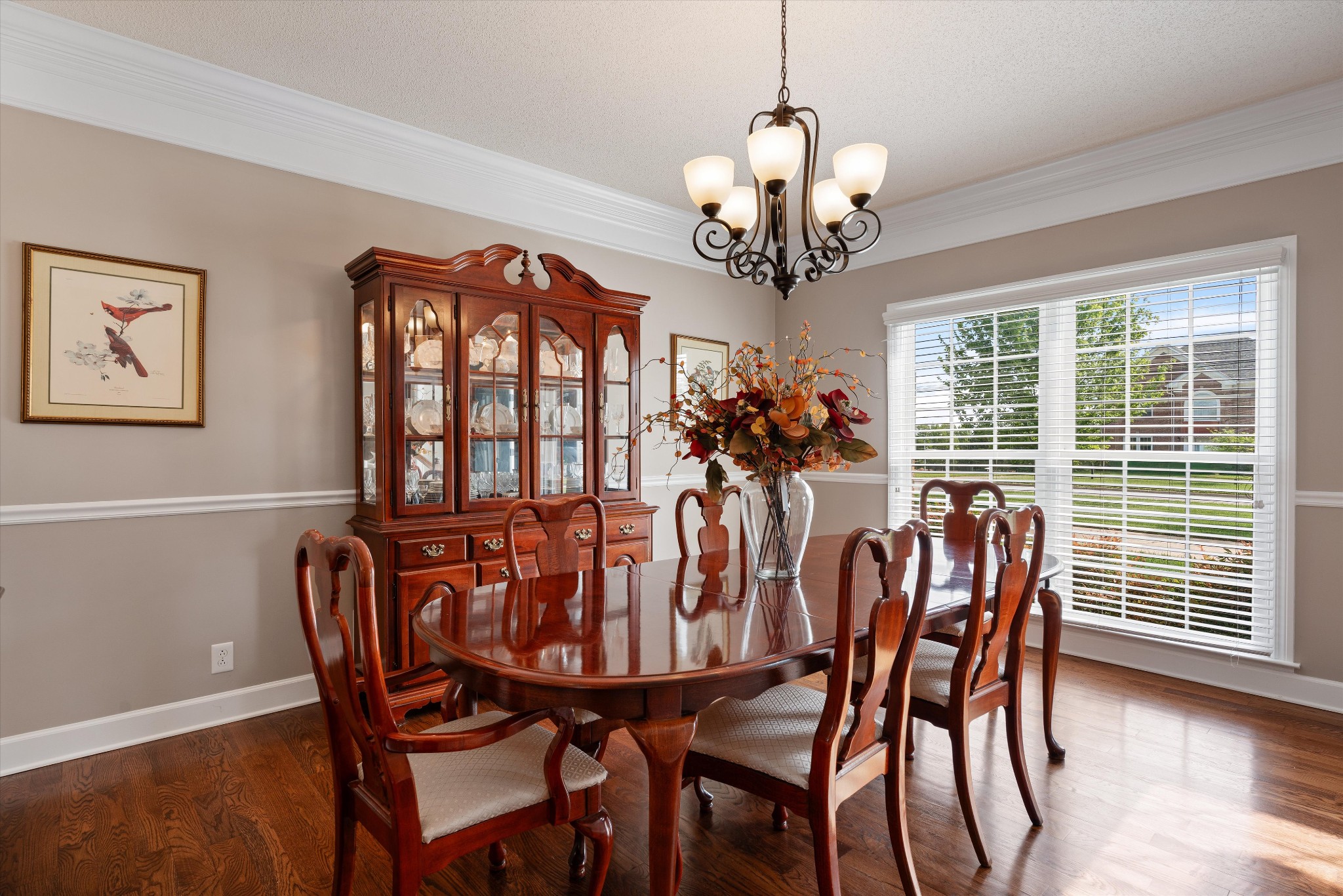506 Pond Apple Road Clarksville, TN 37043 - Photo 14 of 73 a dining room with furniture a chandelier and wooden floor