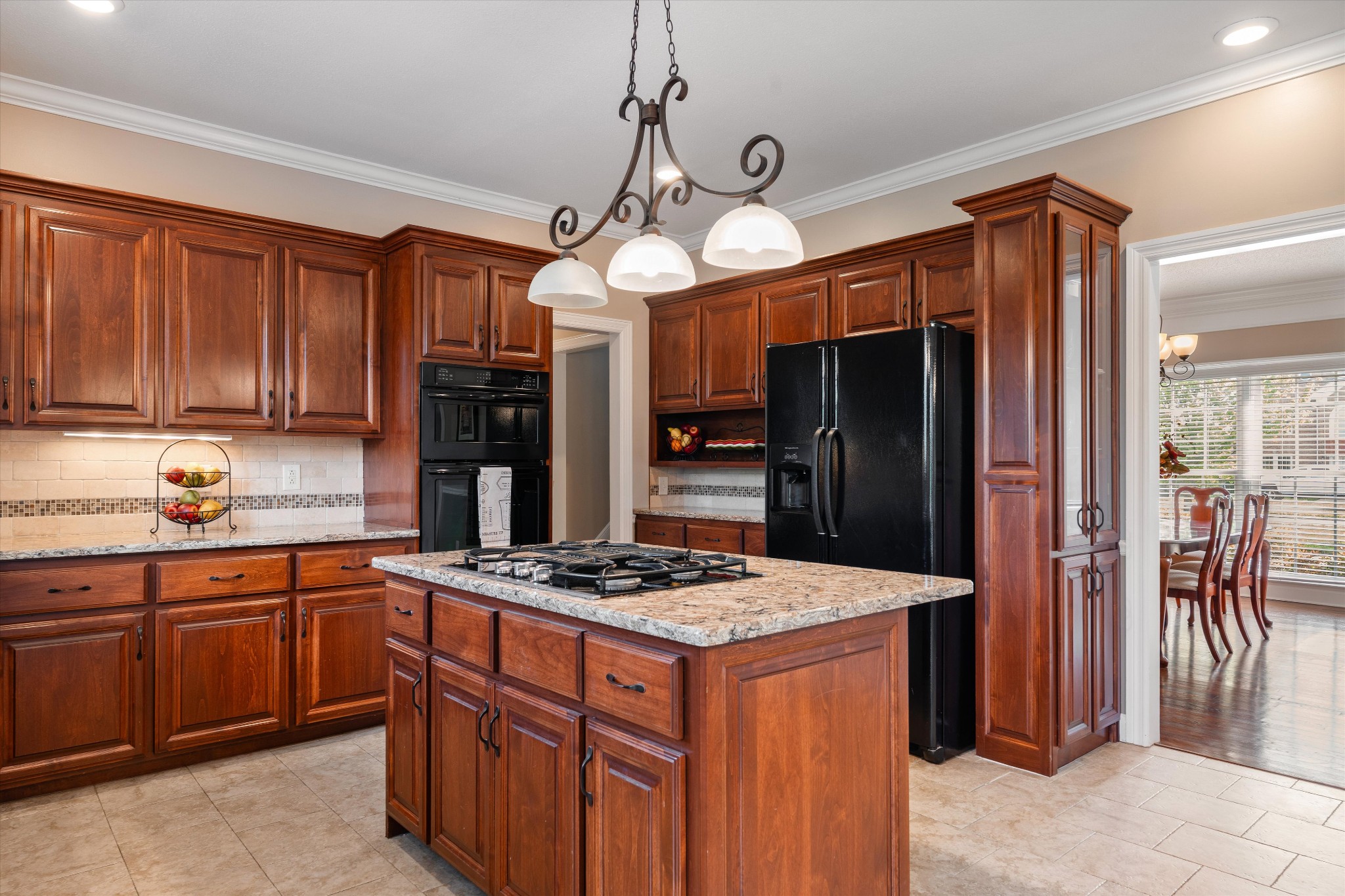 506 Pond Apple Road Clarksville, TN 37043 - Photo 20 of 73 a kitchen with stainless steel appliances granite countertop a refrigerator a sink dishwasher a stove and a refrigerator with wooden cabinets