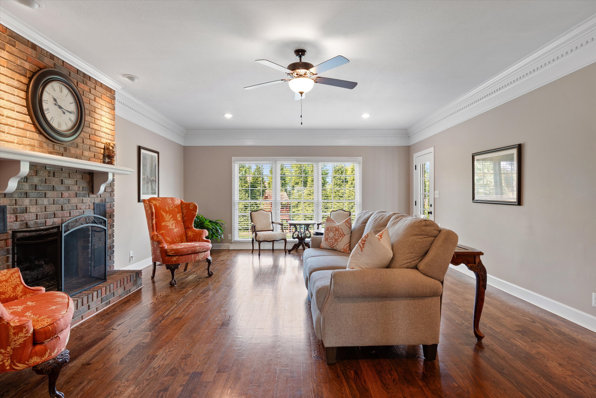 506 Pond Apple Road Clarksville, TN 37043 - Photo 23 of 73 a living room with furniture a fireplace and wooden floor