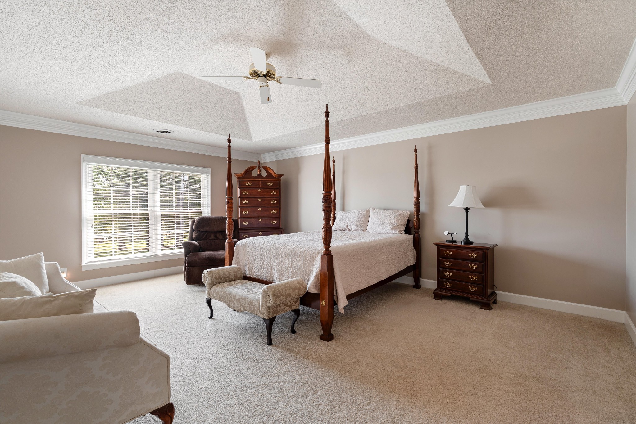 506 Pond Apple Road Clarksville, TN 37043 - Photo 27 of 73 a bedroom with a bed and a couch next to a window