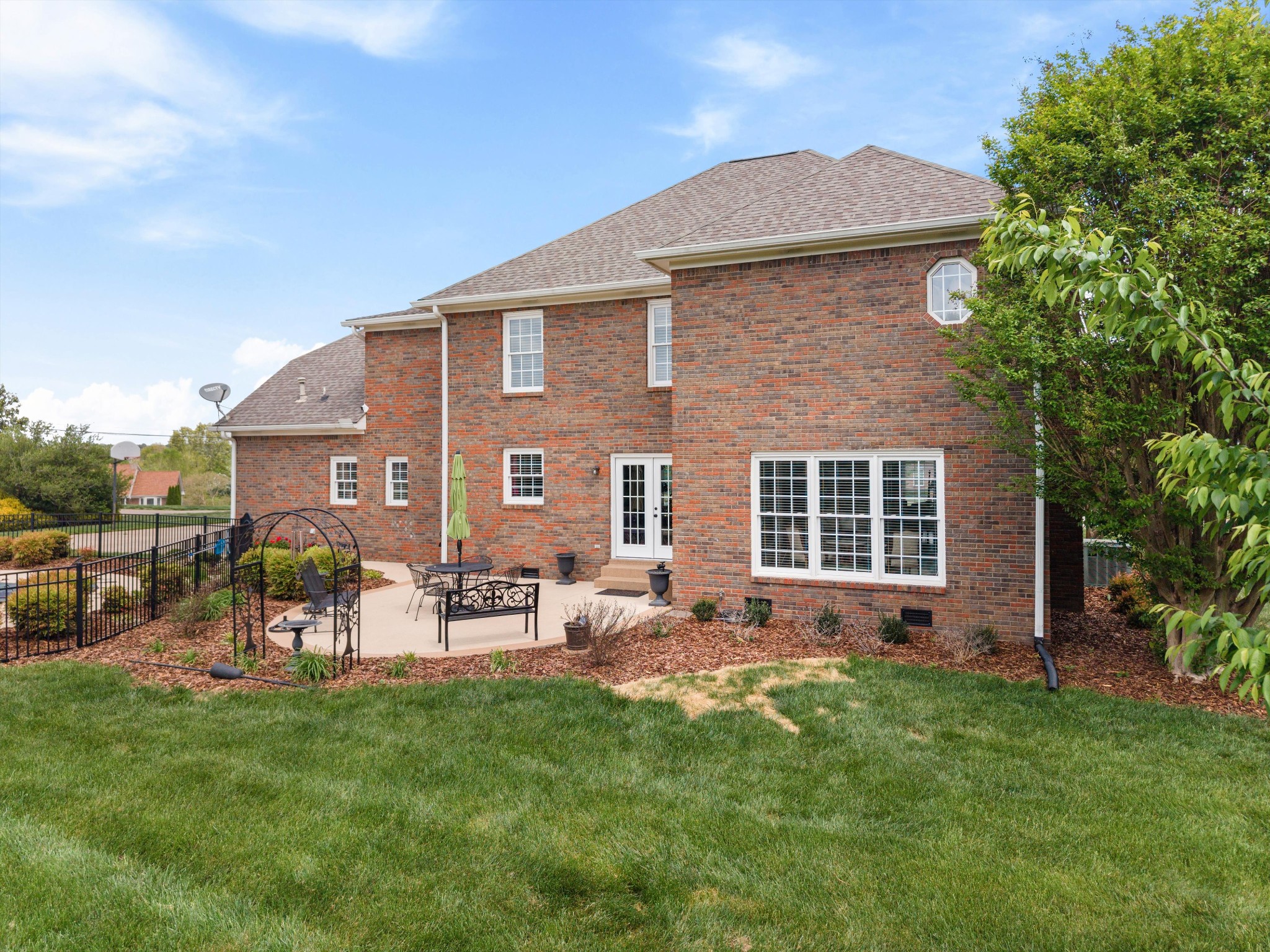 506 Pond Apple Road Clarksville, TN 37043 - Photo 54 of 73 a backyard of a house with yard table and chairs