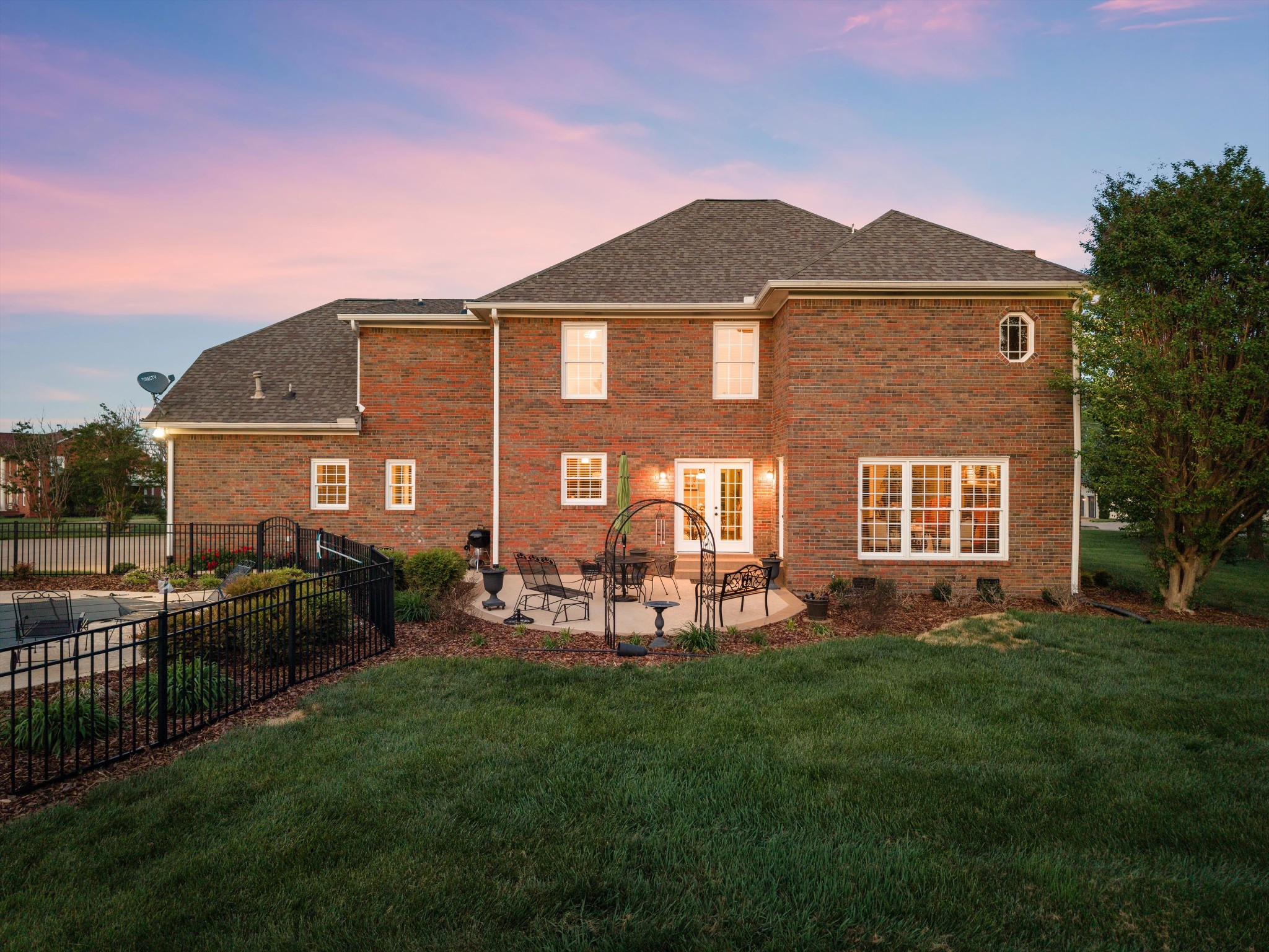 506 Pond Apple Road Clarksville, TN 37043 - Photo 64 of 73 a front view of a house with a yard fire pit and outdoor seating