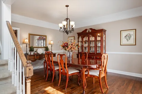 a view of a livingroom with furniture and wooden floor