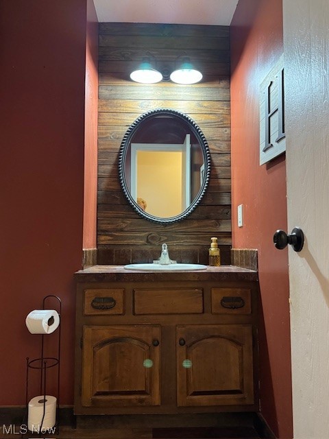 8274 Ruff Road West Salem, OH 44287 - Photo 13 of 30 Bathroom featuring wooden walls and vanity
