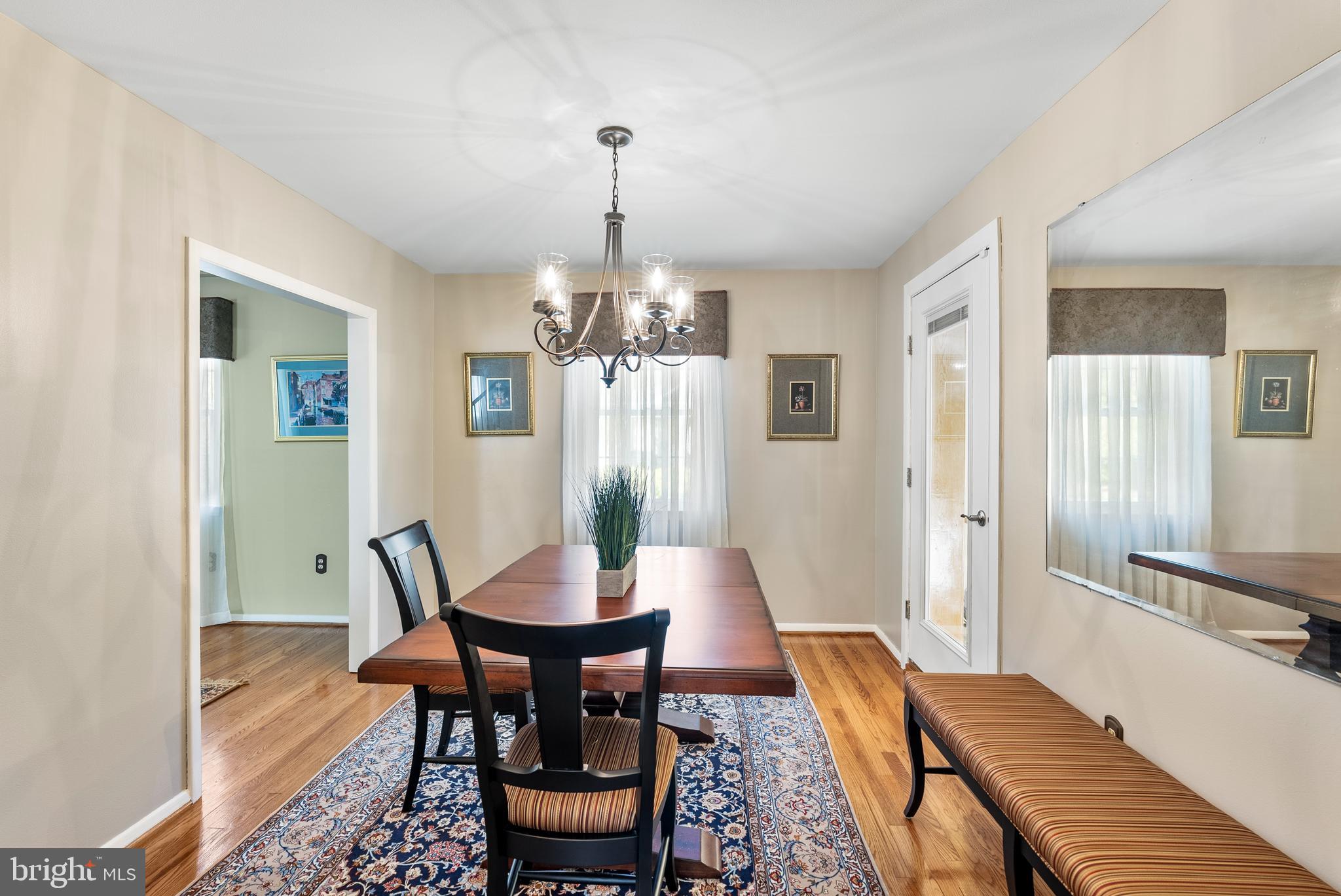907 Arran Road Baltimore, MD 21239 - Photo 14 of 41 a view of a dining room with furniture and wooden floor