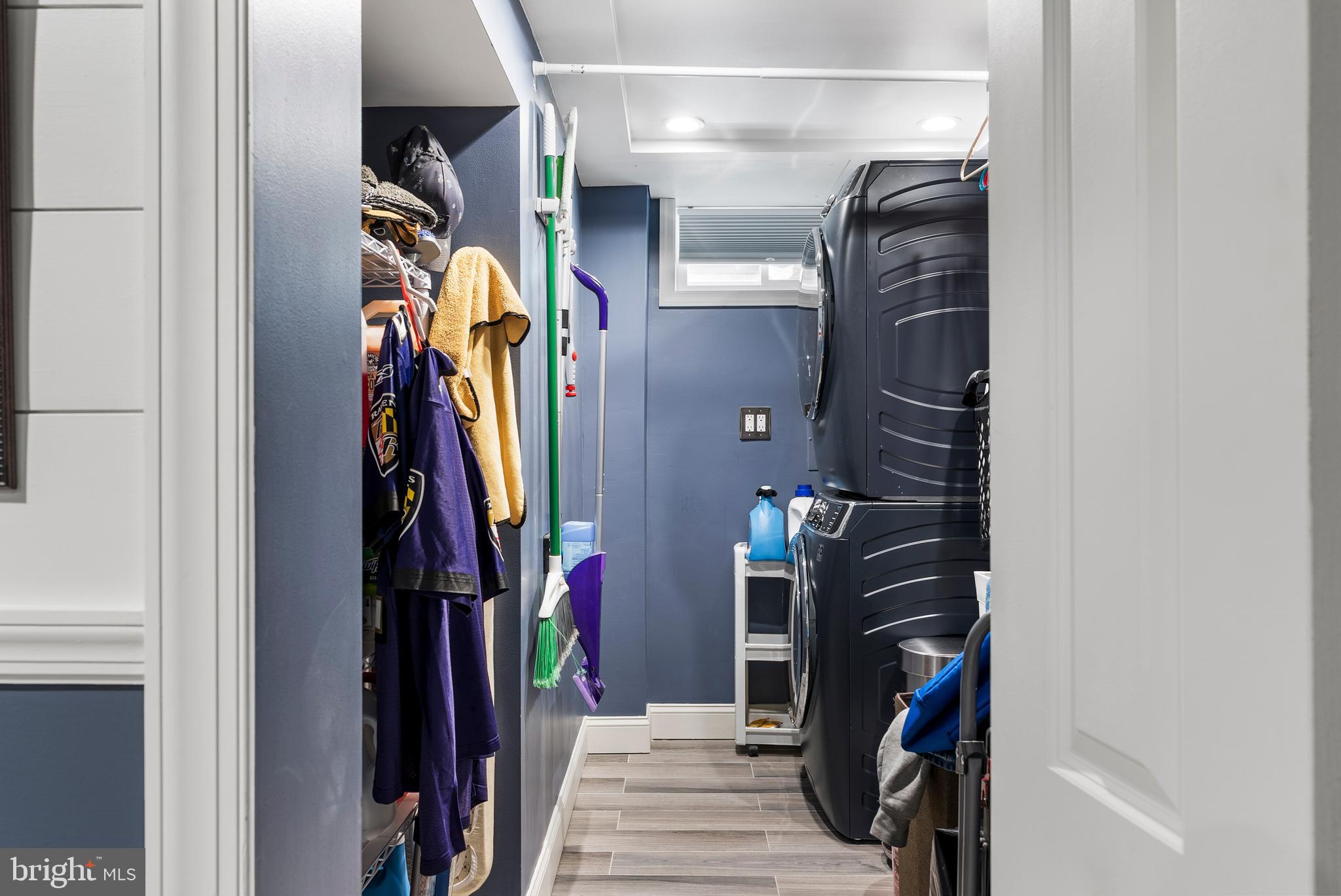 907 Arran Road Baltimore, MD 21239 - Photo 30 of 41 a view of walk in closet with clothes and shoes