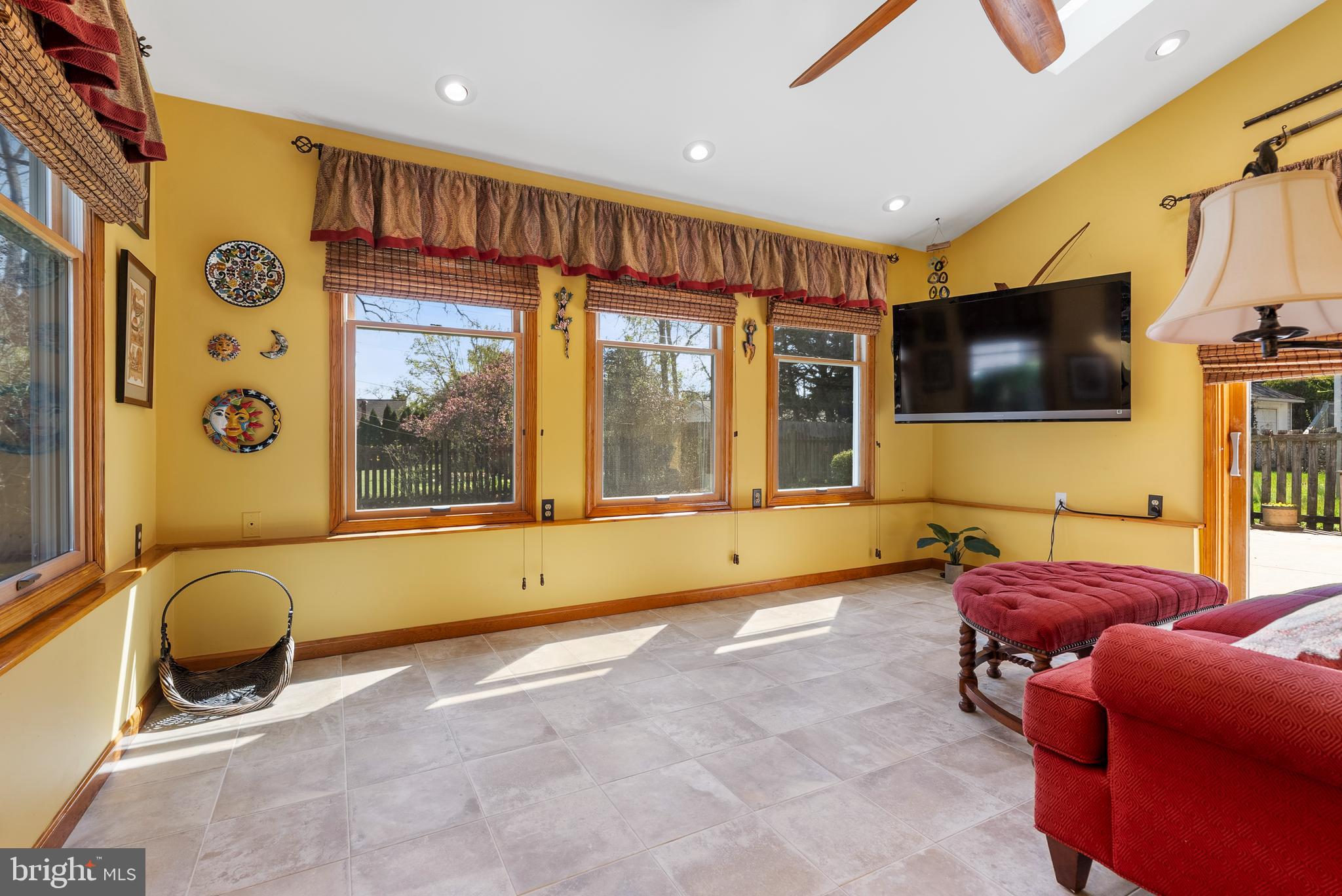 907 Arran Road Baltimore, MD 21239 - Photo 7 of 41 a living room with furniture and a flat screen tv