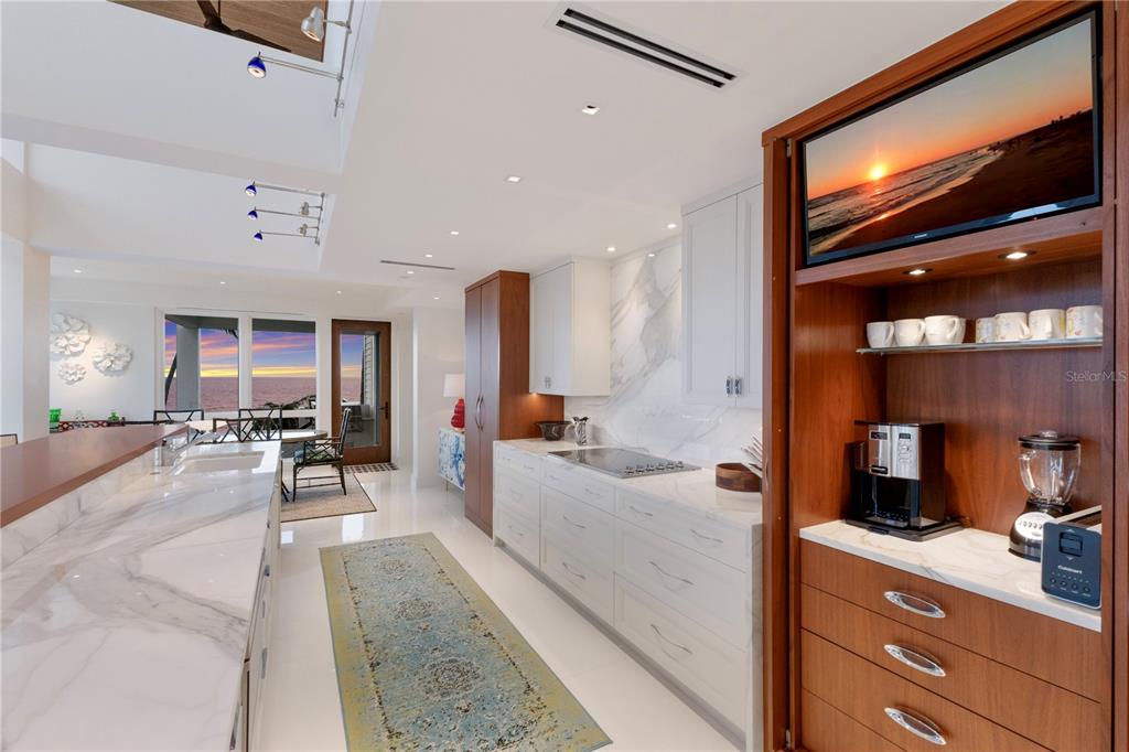 641 Boca Bay Drive Boca Grande, FL 33921 - Photo 10 of 74 a large space with a large mirror and furniture