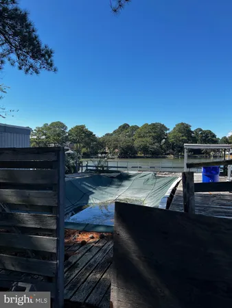 a view of swimming pool from a balcony