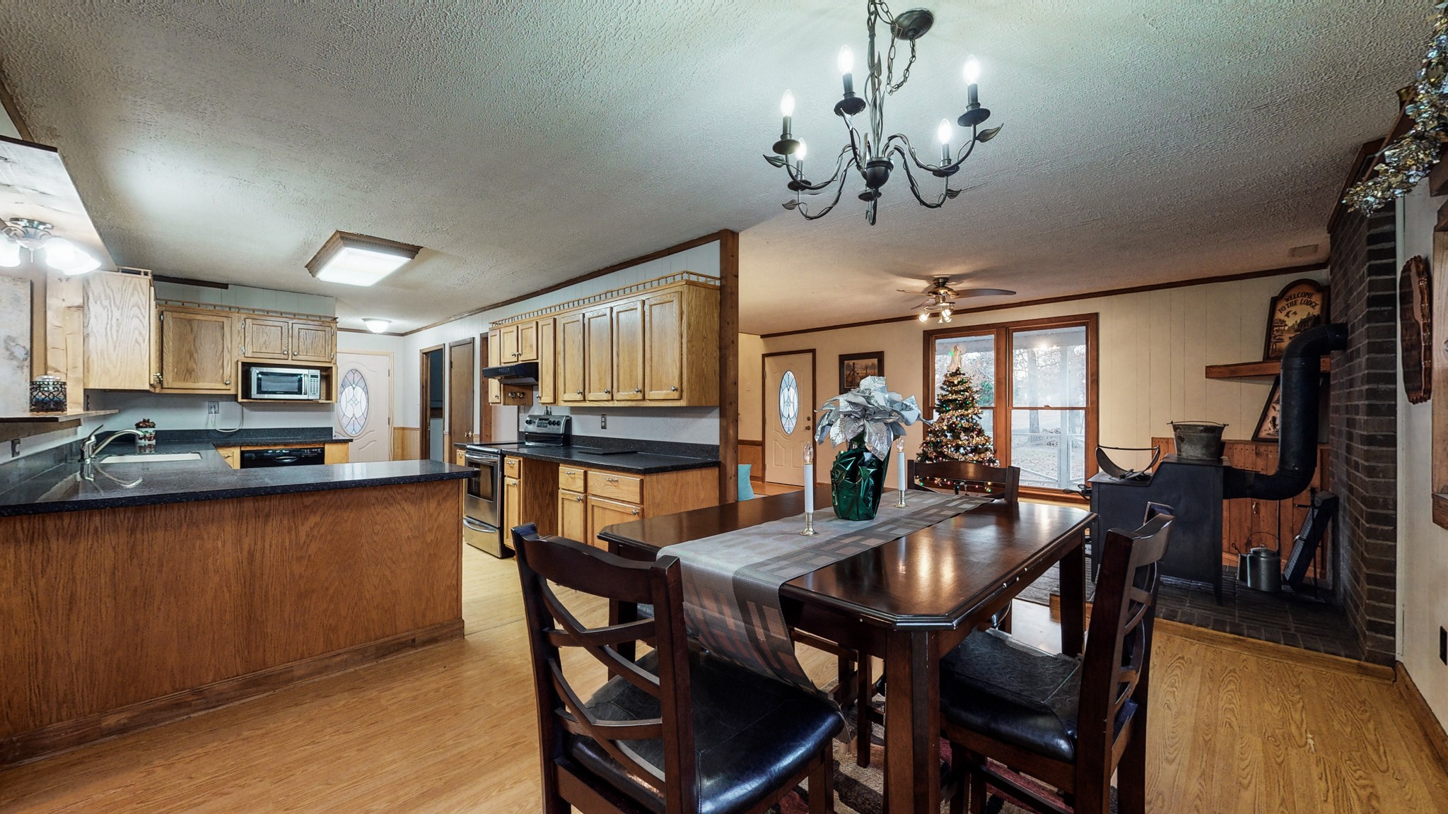 1225 Manley Loop Dickson, TN 37055 - Photo 16 of 50 a view of a dining room with furniture window and wooden floor