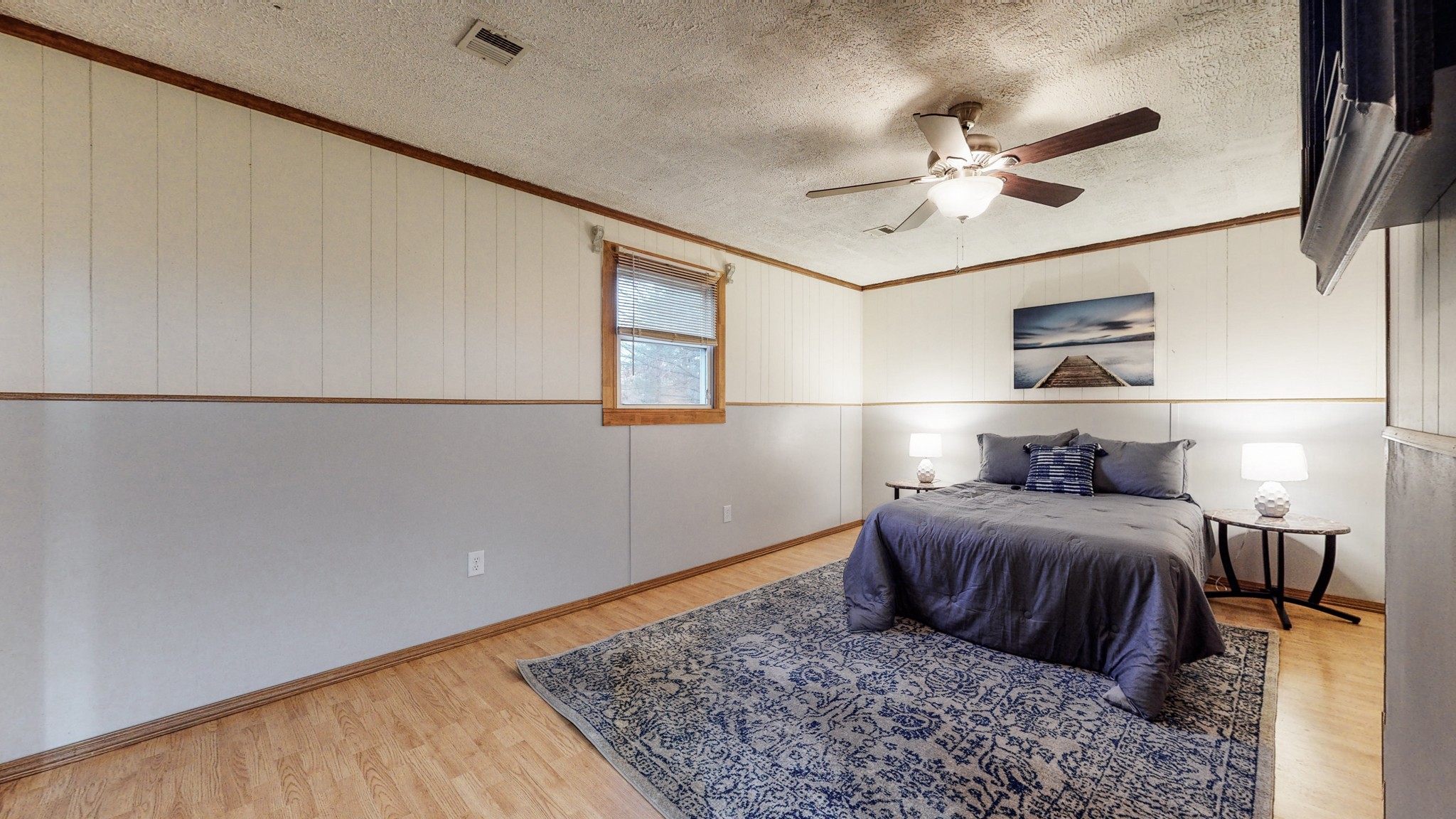 1225 Manley Loop Dickson, TN 37055 - Photo 24 of 50 a bedroom with a bed and a chandelier
