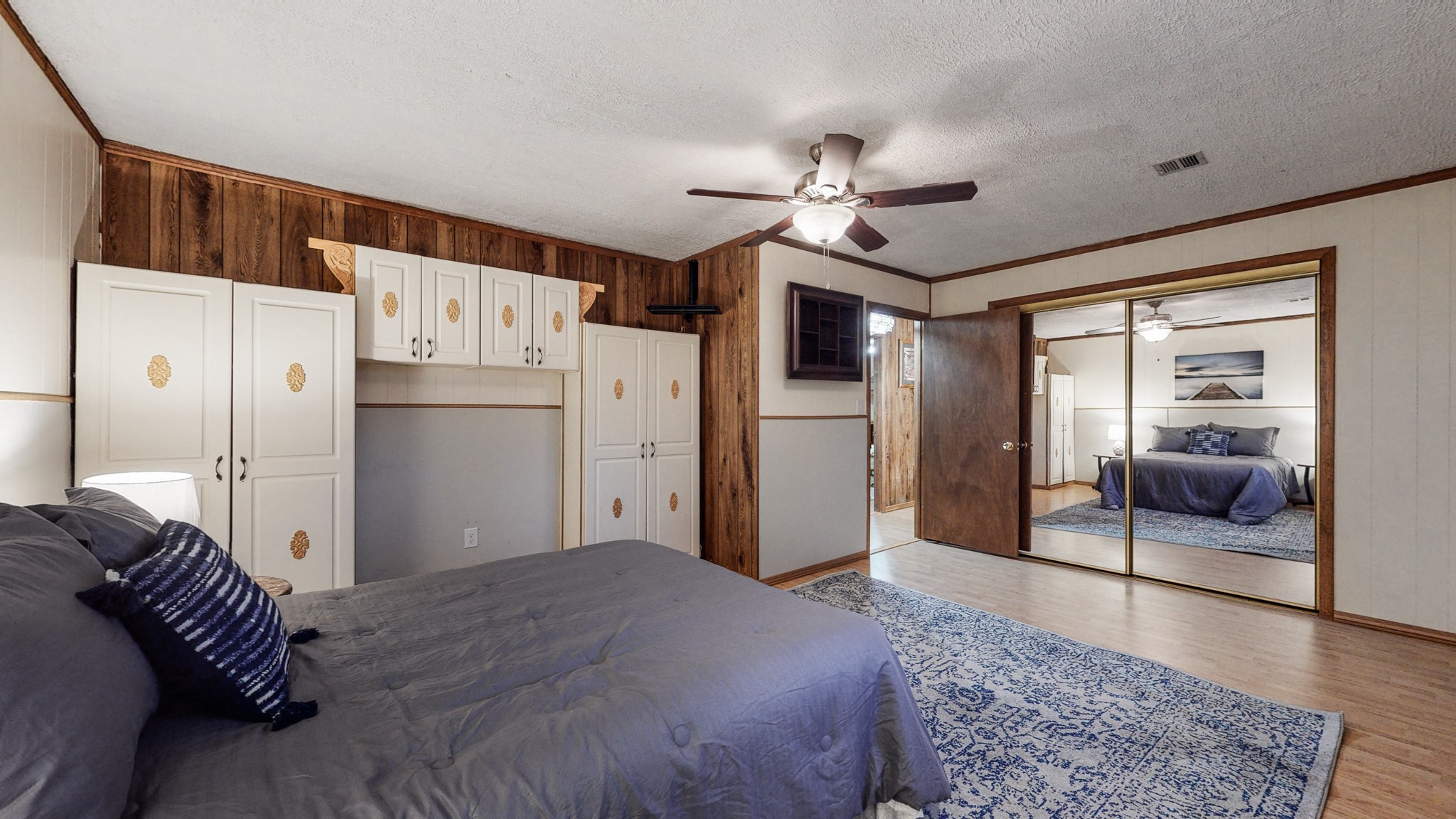 1225 Manley Loop Dickson, TN 37055 - Photo 25 of 50 a bedroom with a bed and a refrigerator