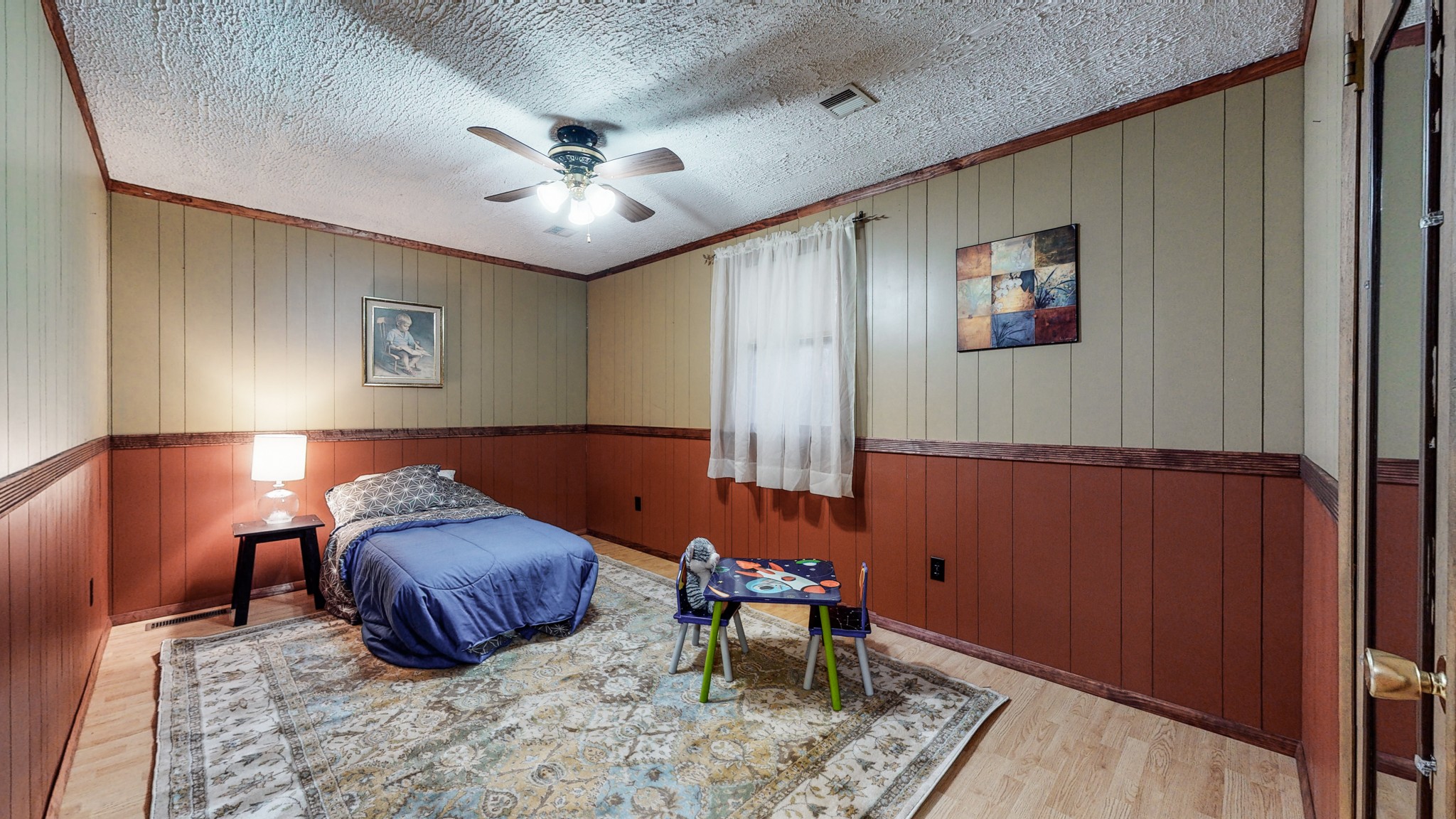 1225 Manley Loop Dickson, TN 37055 - Photo 28 of 50 a room with furniture and a chandelier