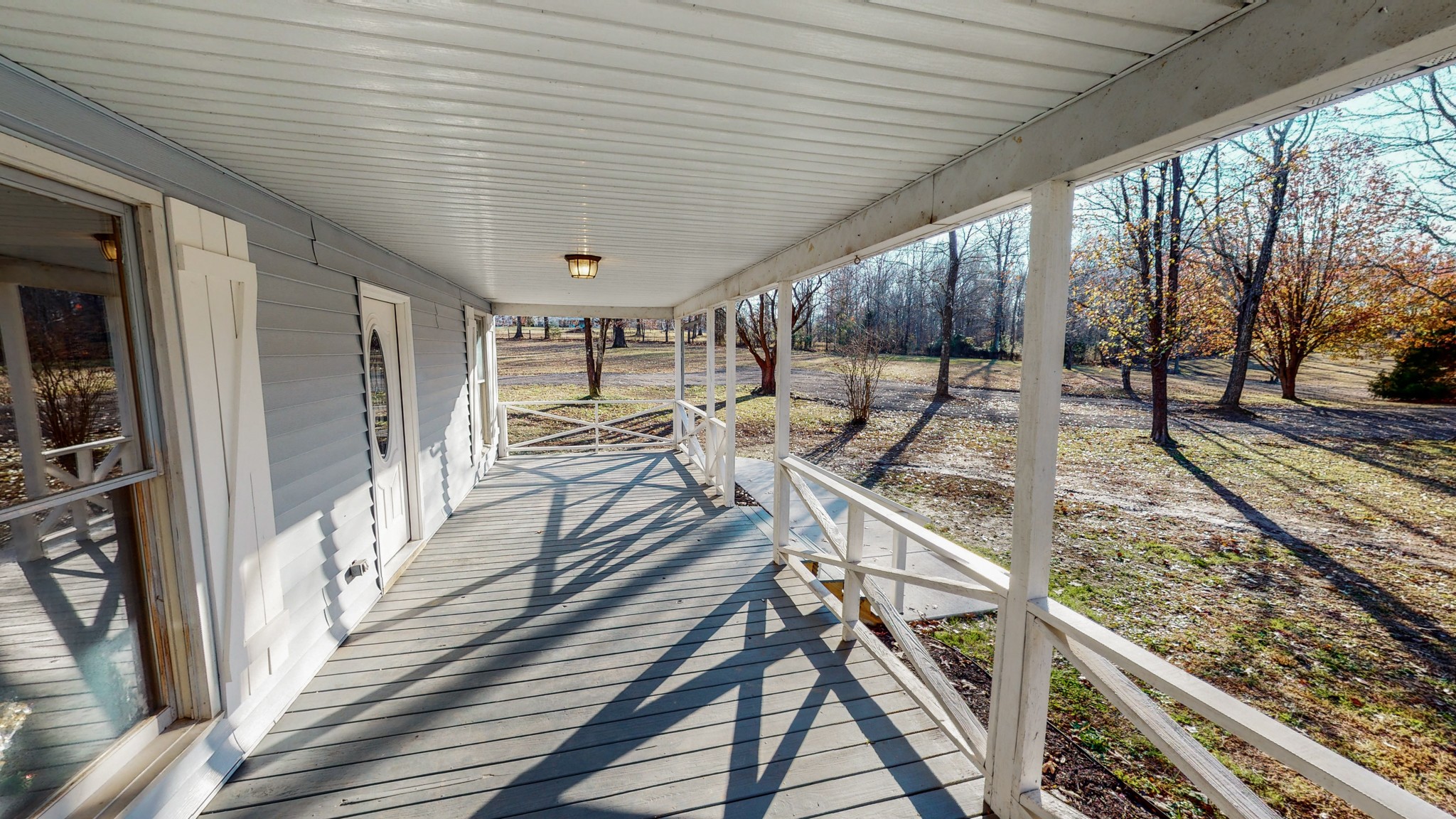 1225 Manley Loop Dickson, TN 37055 - Photo 4 of 50 a view of a patio with wooden floor