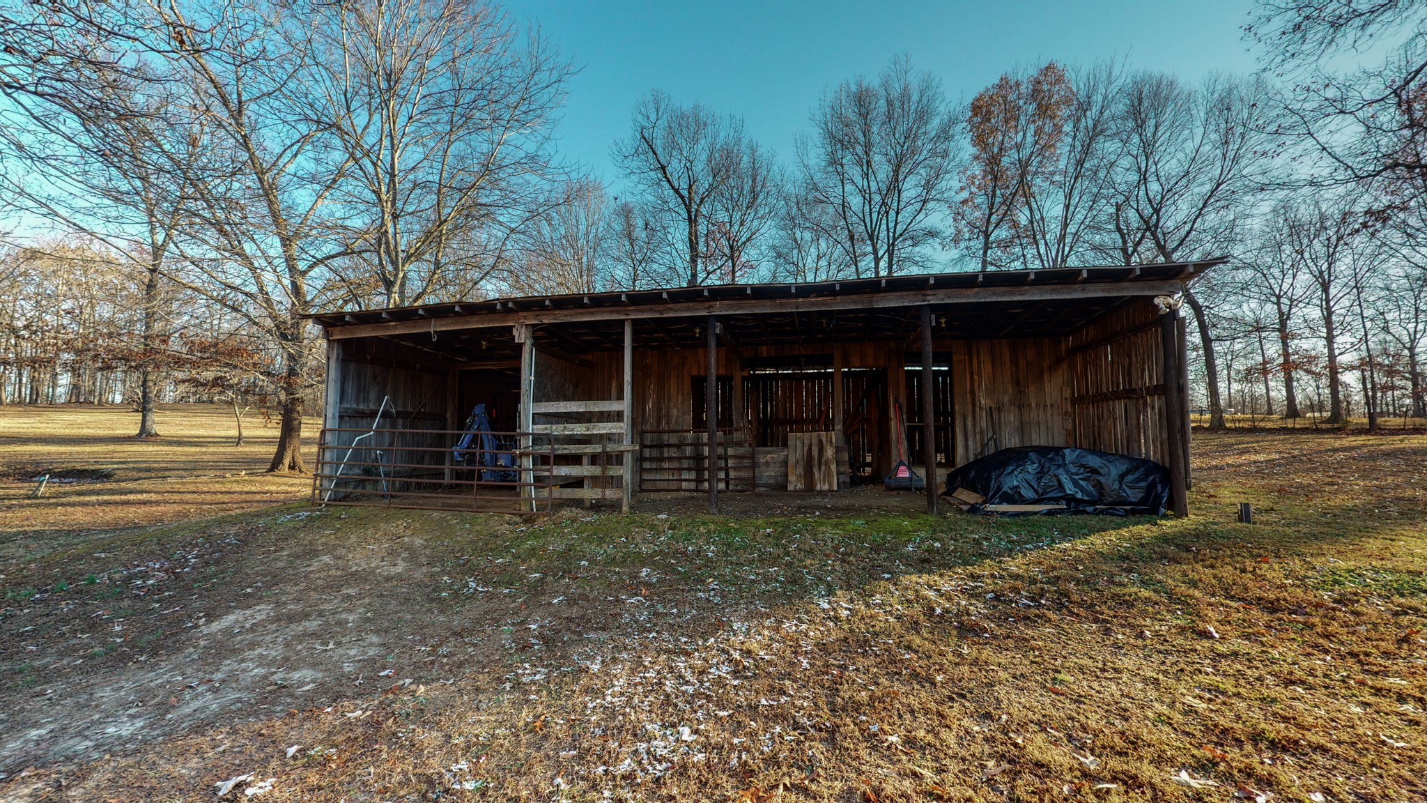 1225 Manley Loop Dickson, TN 37055 - Photo 41 of 50 a view of a house with a yard and garage