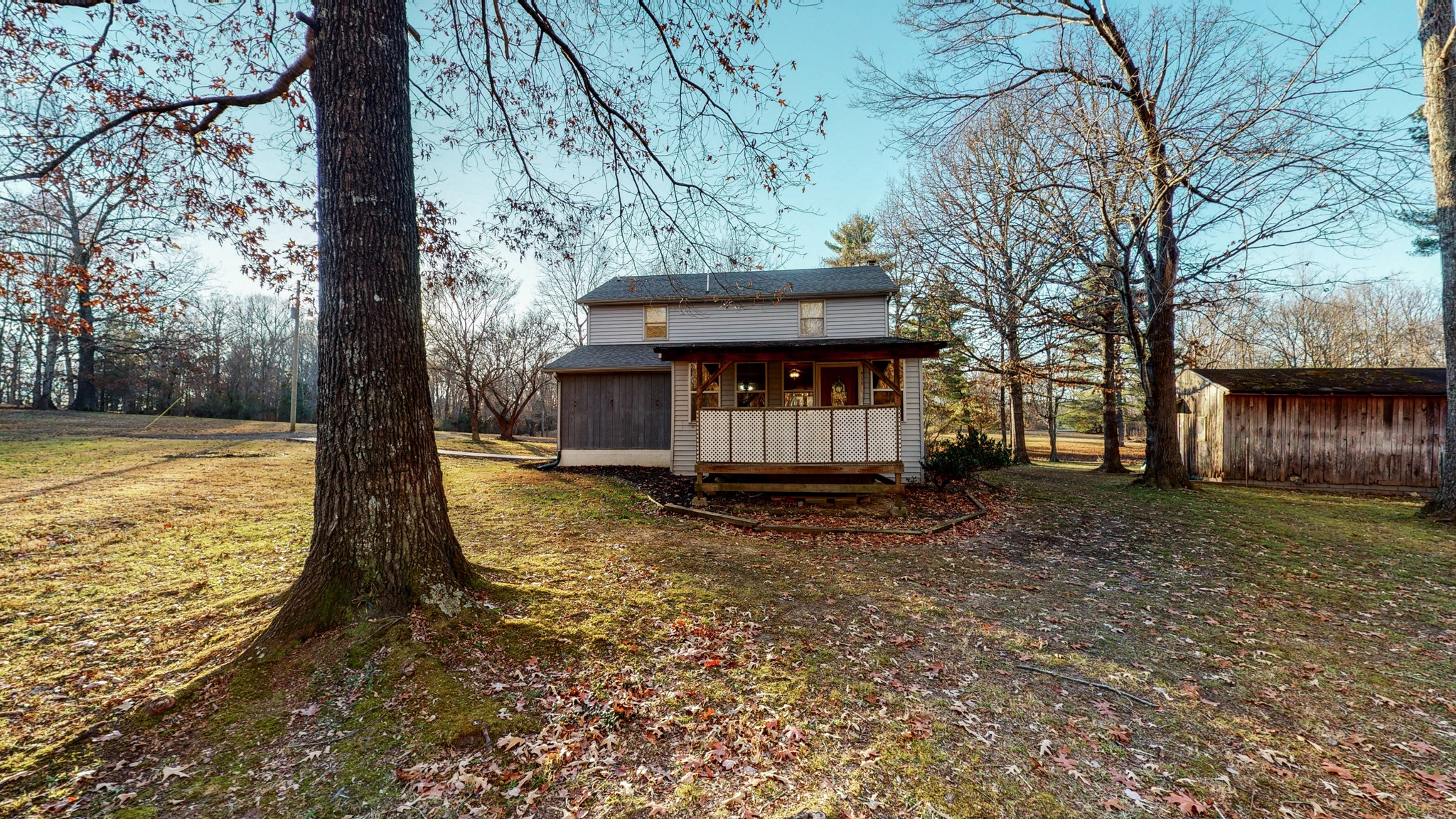 1225 Manley Loop Dickson, TN 37055 - Photo 47 of 50 a view of a house with backyard and trees
