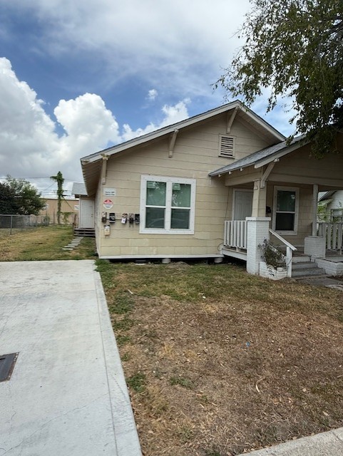 1507 7th Street Corpus Christi, TX 78404 - Photo 2 of 9 a house with white door of middle