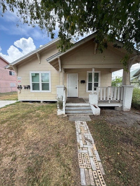 1507 7th Street Corpus Christi, TX 78404 - Photo 3 of 9 a front view of a house with garden