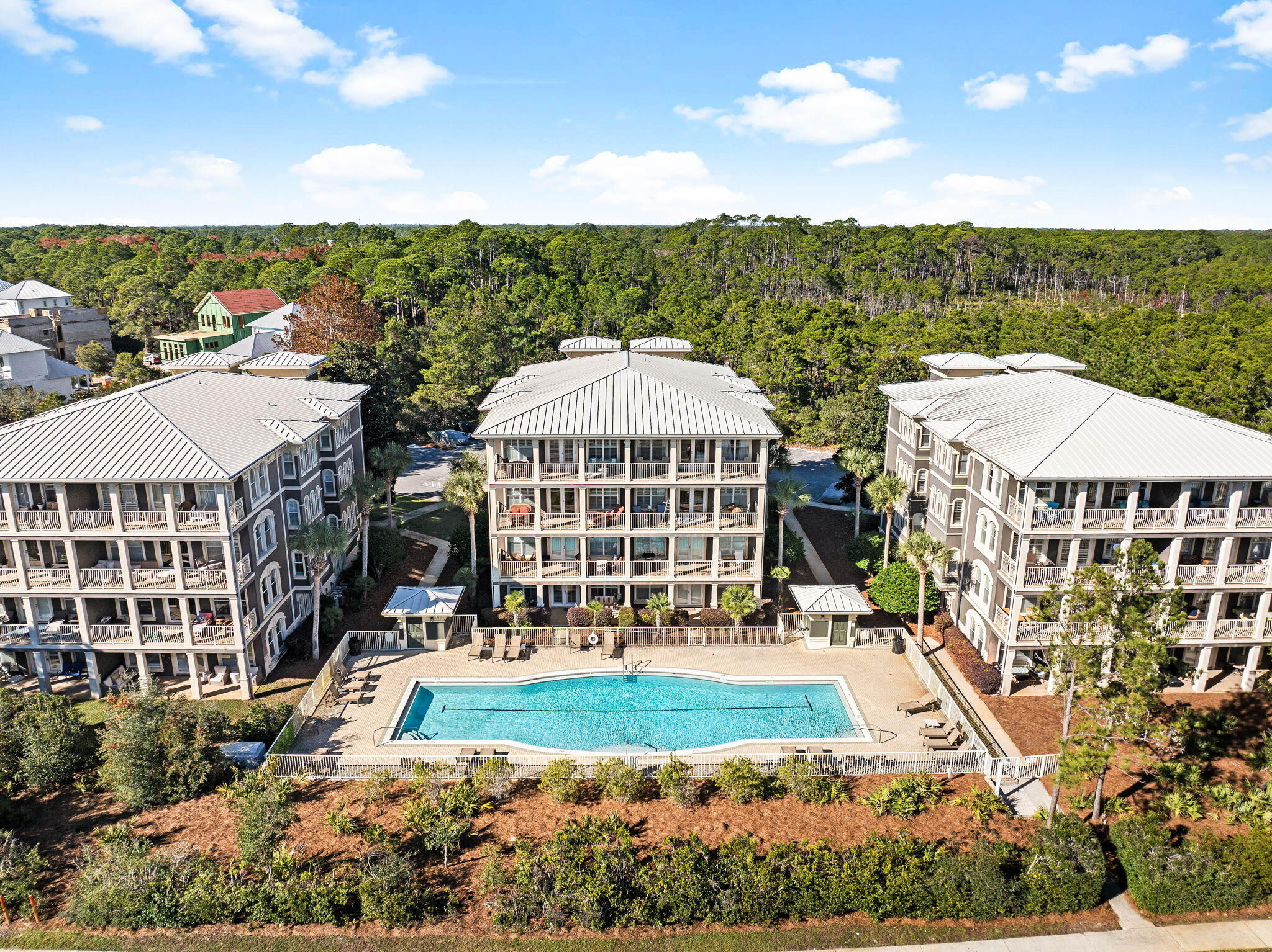 a view of a large building with a yard