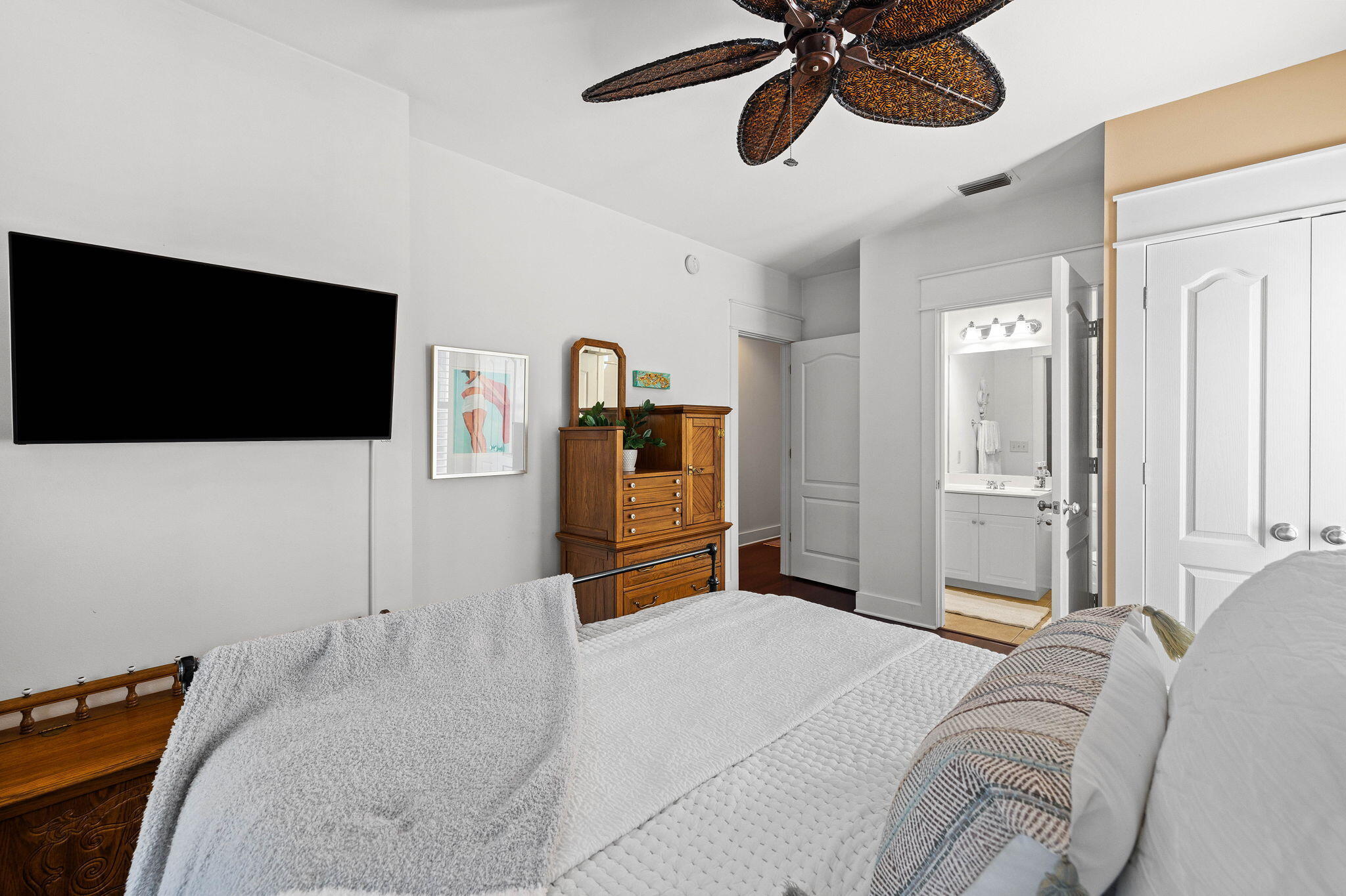 4545 East County Highway 30A, Unit B202 Santa Rosa Beach, FL 32459 - Photo 17 of 42 a bedroom with a bed and a flat screen tv