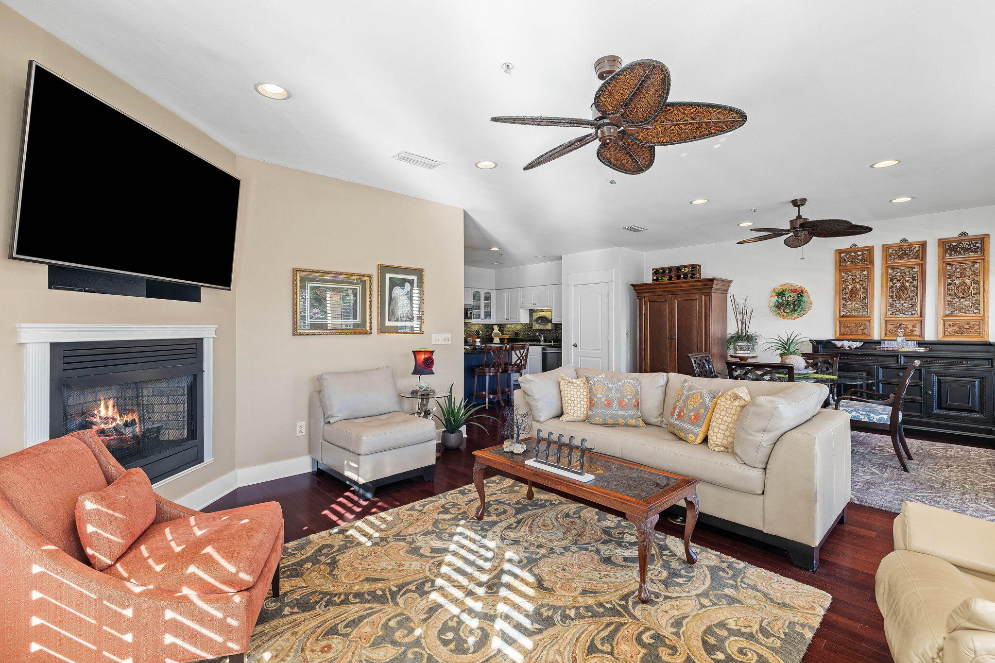 4545 East County Highway 30A, Unit B202 Santa Rosa Beach, FL 32459 - Photo 31 of 42 a living room with furniture fireplace and a flat screen tv
