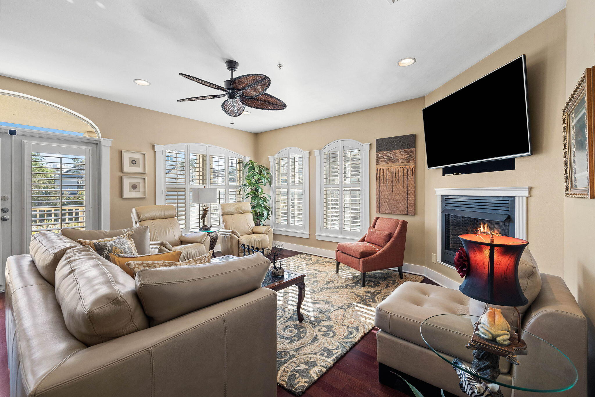 4545 East County Highway 30A, Unit B202 Santa Rosa Beach, FL 32459 - Photo 7 of 42 a living room with furniture a fireplace and a flat screen tv