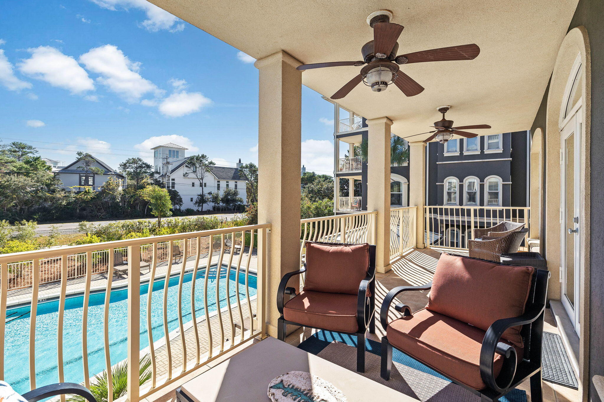 4545 East County Highway 30A, Unit B202 Santa Rosa Beach, FL 32459 - Photo 9 of 42 a view of a chairs and table in a balcony