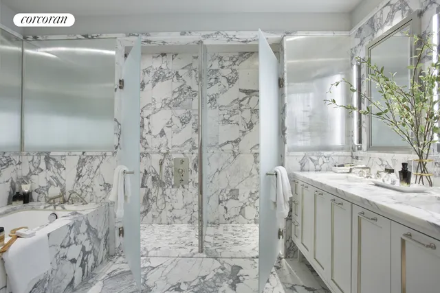 a picture of a bench in front of a wall