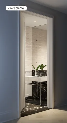 a bathroom with a shower and a sink