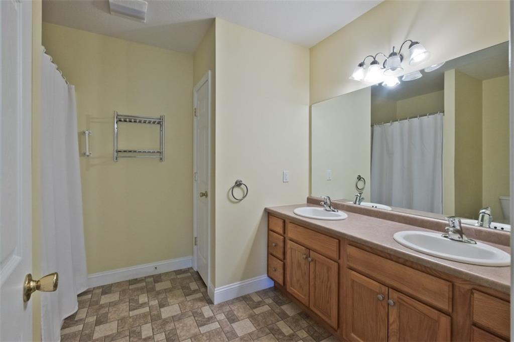 36 Kavanaugh Road, Unit 36 Old Orchard Beach, ME 04064 - Photo 30 of 35 Master bath with double sinks, and...