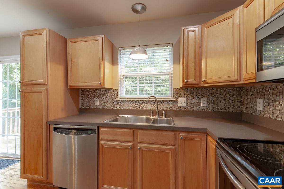 3 Bernardsburg Road Palmyra, VA 22963 - Photo 11 of 38 a kitchen with granite countertop a sink cabinets and window